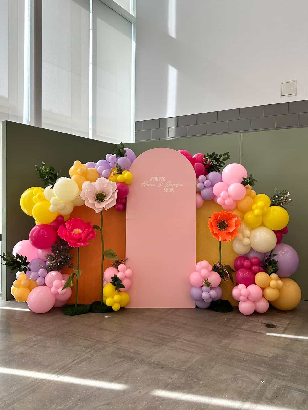 Pastel balloon garland and backdrop install in Winnipeg