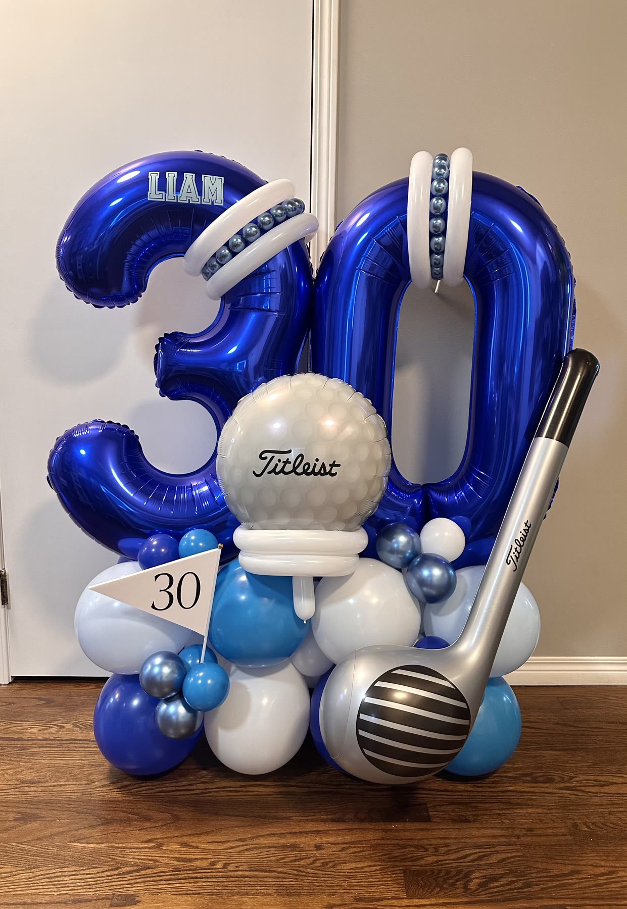 Golf-themed balloon number stack for a 30th birthday in Winnipeg