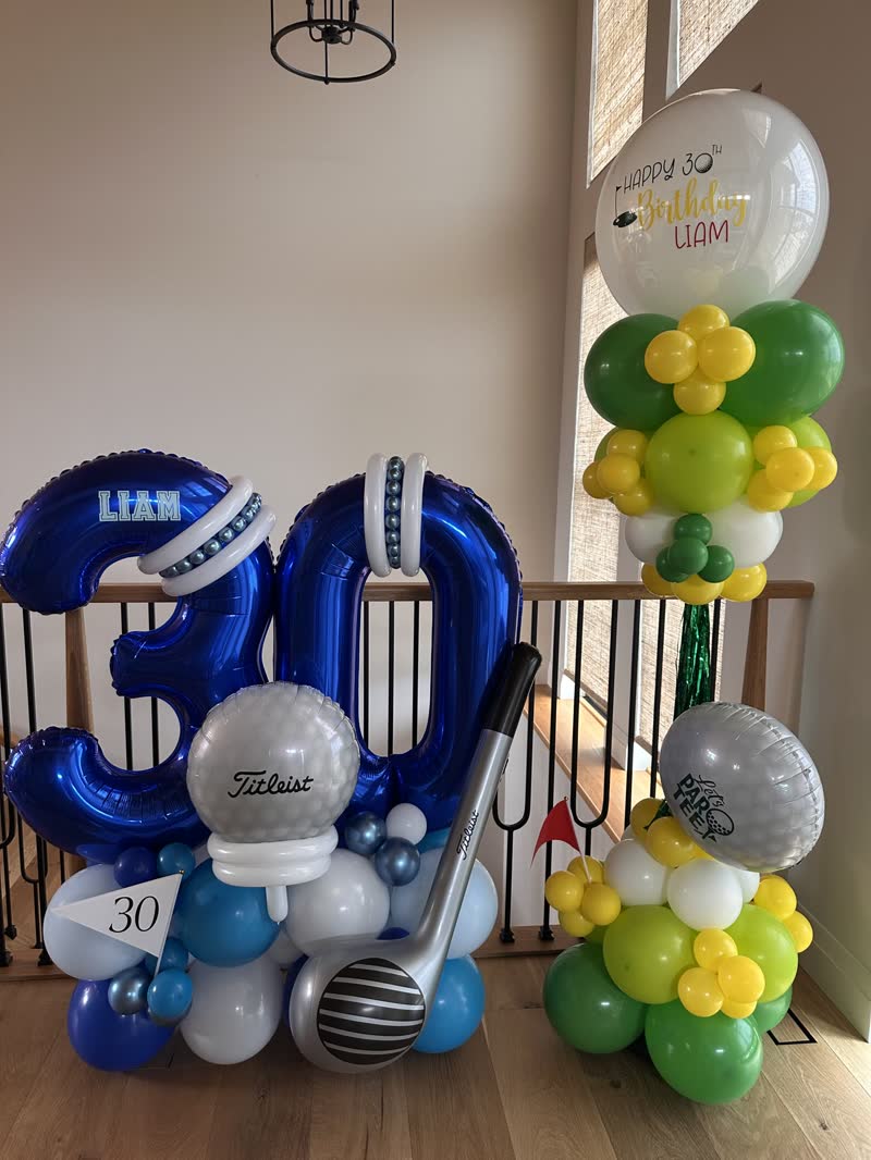 Golf-themed number stack and matching balloon column, Winnipeg