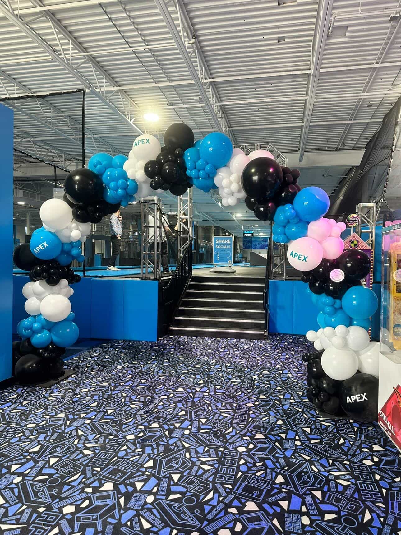 Pastel walk-through balloon arch installed in Winnipeg