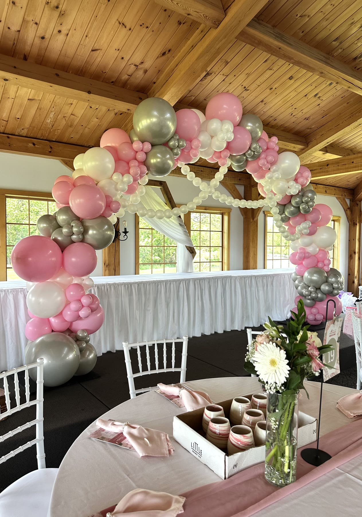 Custom colour balloon arch set up for a Winnipeg event