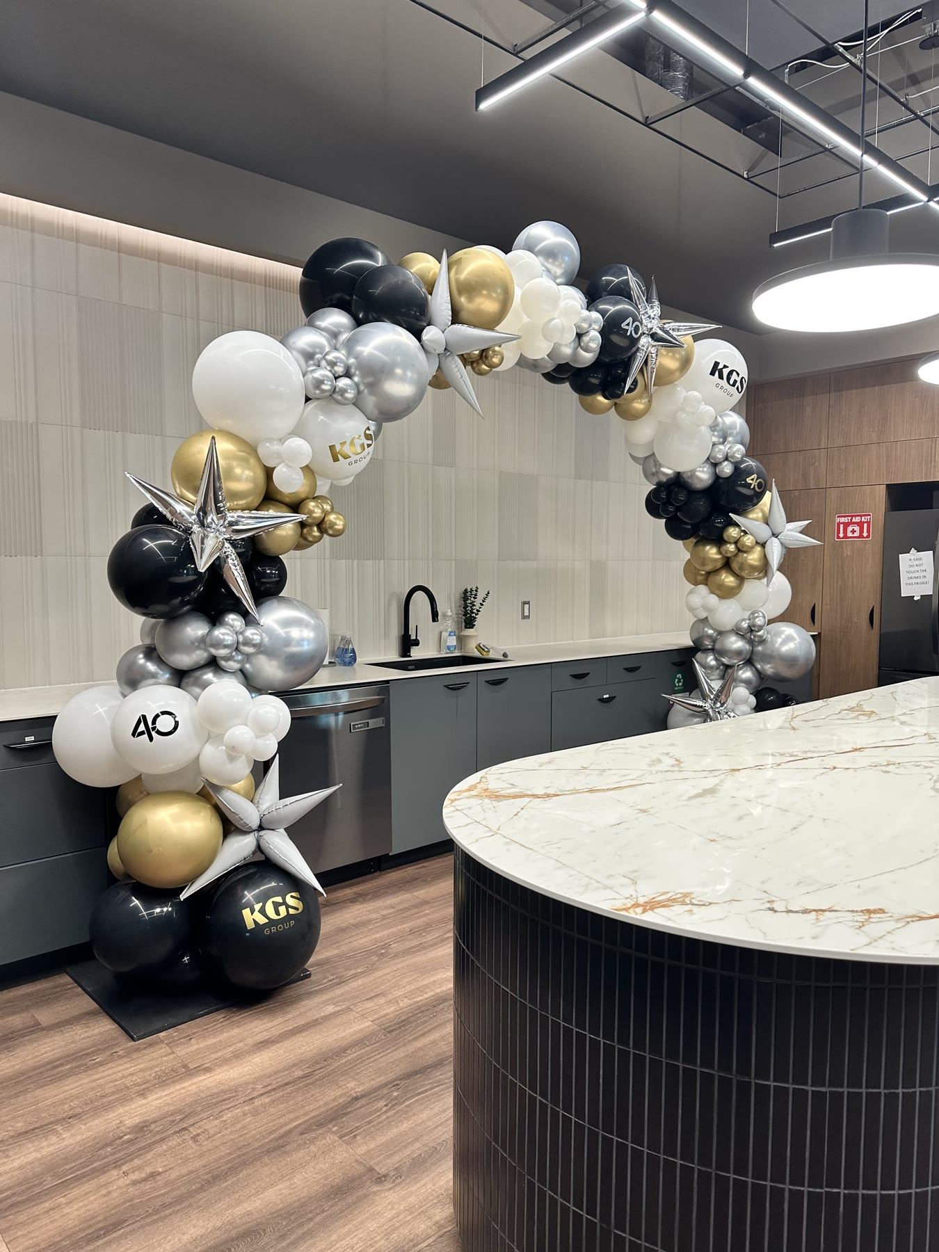 Balloon arch framing a doorway at a Winnipeg celebration